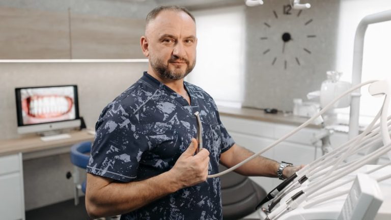 A portrait of a dentist in a modern clinic, showcasing dental equipment.